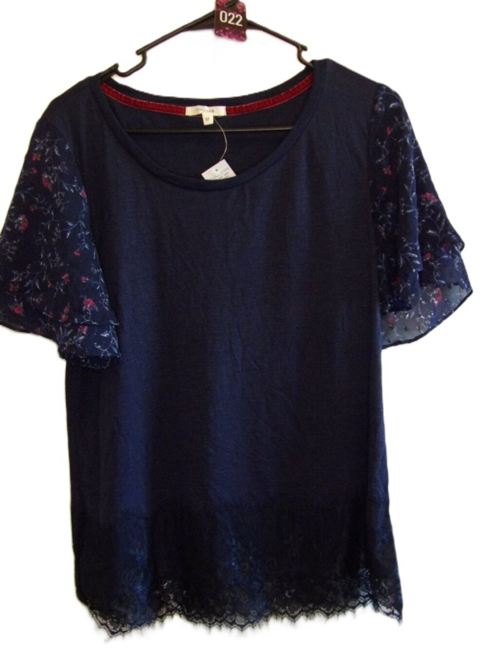 Maurices, NWT navy blue blouse with  sheer flowy floral sleeves, and lace trim (